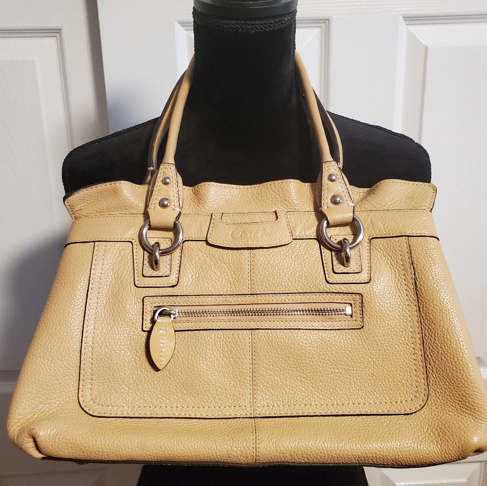 Coach butter color genuine leather handbag